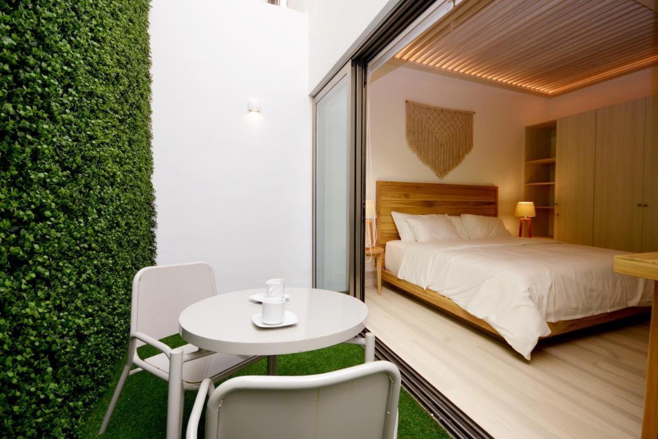 Mayan Monk Suites Плая дел Кармен Екстериор снимка